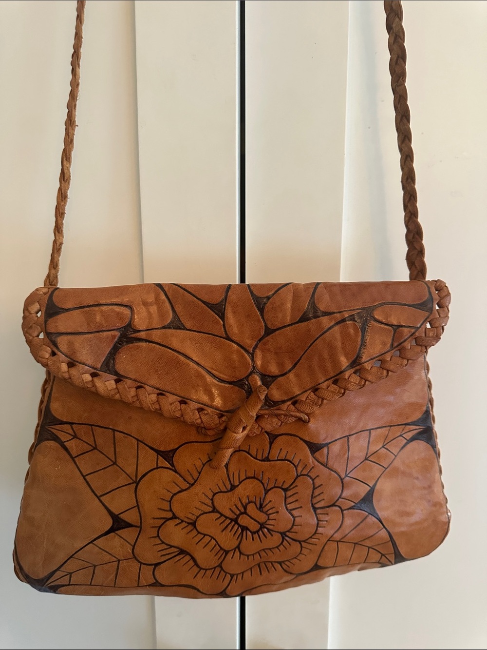 Hand tooled leather shoulder bag
